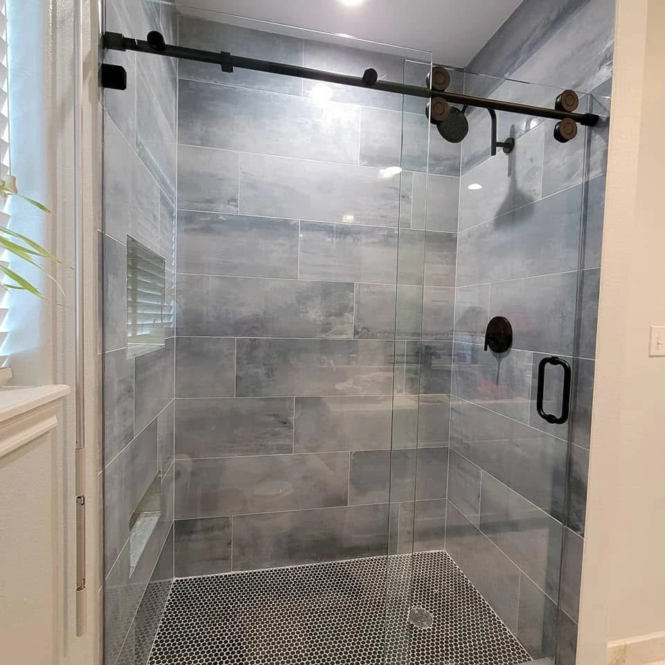 Wooden privacy shower enclosure for outdoor pool area